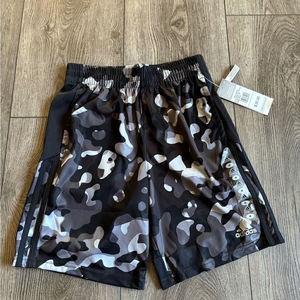 Adidas boys basketball shorts. Great to use for any sport practice